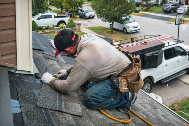 Professional Roofing technician working in Orange City, IA